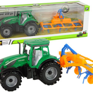 Traktor s rozmetačem sena třecí pohon zelený