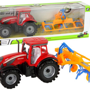 Traktor s třecím pohonem a se shrnovačem sena červený